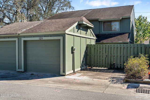 garage featuring fence