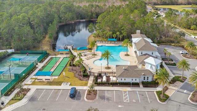birds eye view of property with a water view
