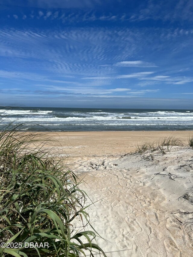 view of water feature with a view of the beach