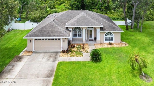 5935 Shady Creek Ln, Port Orange, FL 32128 - view of front of house featuring stucco siding, a garage, a shingled roof, and concrete driveway