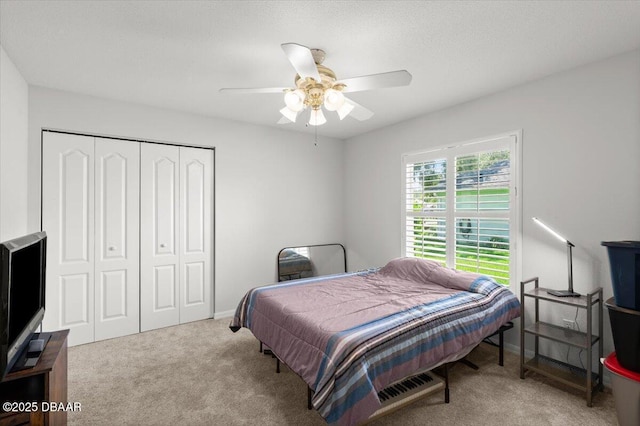 5935 Shady Creek Ln, Port Orange, FL 32128 - carpeted bedroom featuring a closet and ceiling fan
