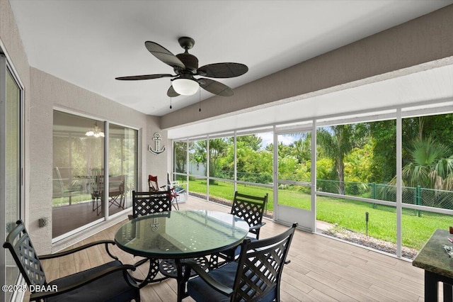 5935 Shady Creek Ln, Port Orange, FL 32128 - sunroom / solarium with outdoor dining space and ceiling fan