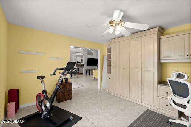 5935 Shady Creek Ln, Port Orange, FL 32128 - exercise room with a ceiling fan, light tile patterned flooring, and baseboards