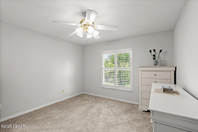 5935 Shady Creek Ln, Port Orange, FL 32128 - unfurnished bedroom with light colored carpet, baseboards, and a ceiling fan
