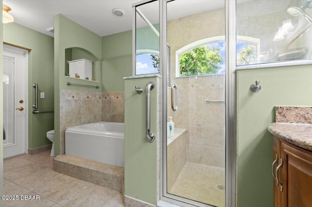 5935 Shady Creek Ln, Port Orange, FL 32128 - full bathroom with a garden tub, vanity, a stall shower, and tile patterned flooring