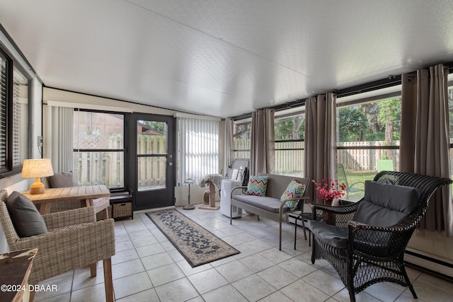 sunroom / solarium with baseboard heating