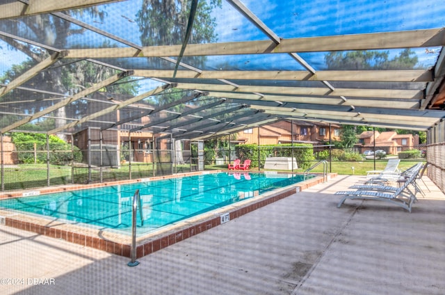 view of swimming pool featuring a patio area