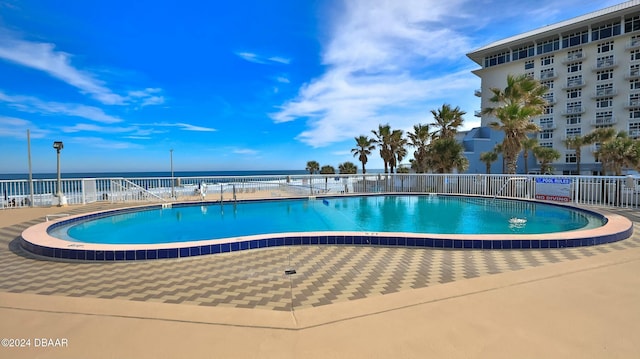 2625 S Atlantic Ave Unit 18Sw, Daytona Beach, FL 32118 - view of pool with a patio area and a water view