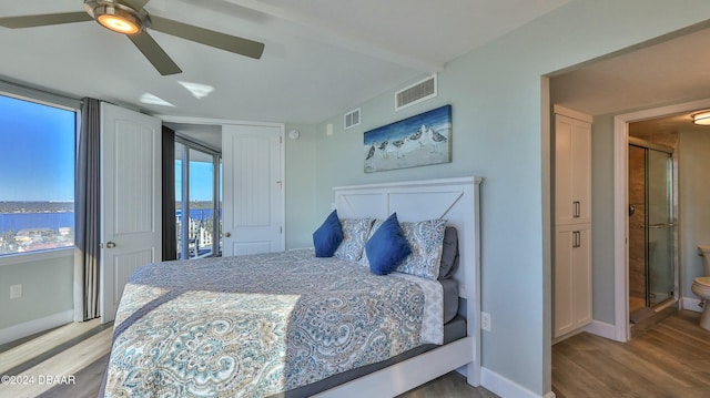 2625 S Atlantic Ave Unit 18Sw, Daytona Beach, FL 32118 - bedroom featuring connected bathroom, ceiling fan, light hardwood / wood-style flooring, and access to exterior