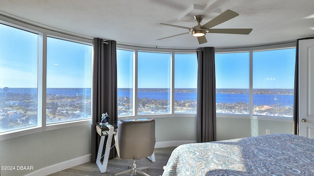 2625 S Atlantic Ave Unit 18Sw, Daytona Beach, FL 32118 - bedroom with hardwood / wood-style flooring, ceiling fan, and a water view