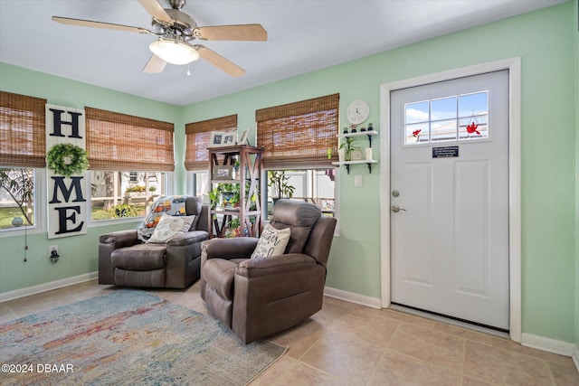 interior space featuring ceiling fan