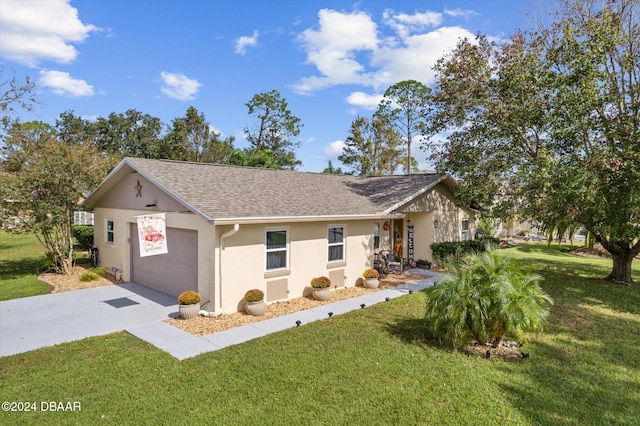 single story home with a front lawn and a garage