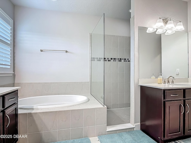 200 Azure Mist Way, Daytona Beach, FL 32124 - full bathroom with a garden tub, vanity, and tiled shower
