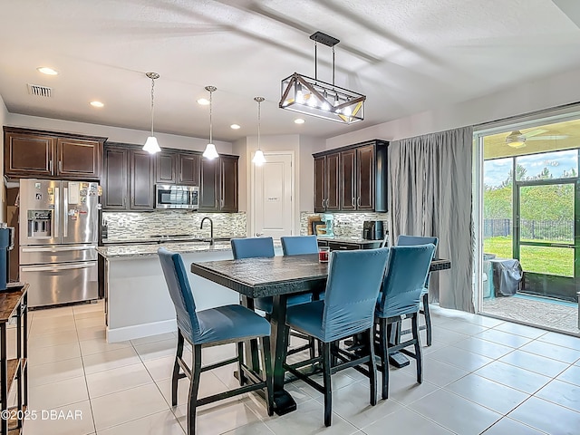 200 Azure Mist Way, Daytona Beach, FL 32124 - dining area featuring light tile patterned flooring and recessed lighting
