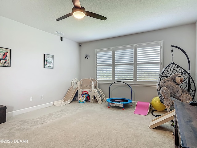 200 Azure Mist Way, Daytona Beach, FL 32124 - game room featuring carpet flooring, ceiling fan, baseboards, and a textured ceiling