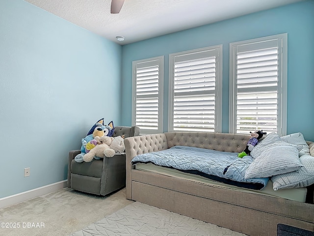 200 Azure Mist Way, Daytona Beach, FL 32124 - carpeted bedroom featuring baseboards and a ceiling fan