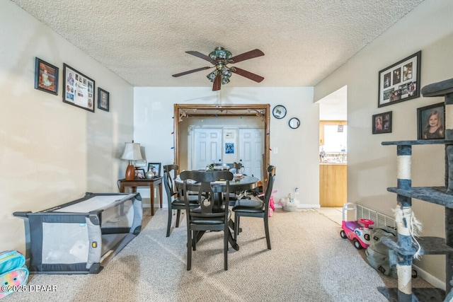 3304 India Palm Dr, Edgewater, FL 32141 - carpeted dining space featuring ceiling fan and a textured ceiling