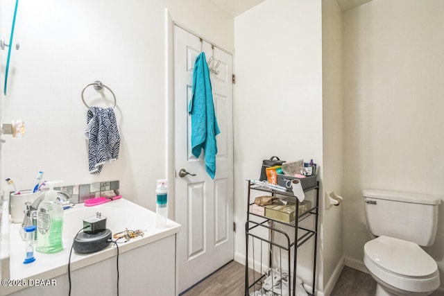 3304 India Palm Dr, Edgewater, FL 32141 - bathroom with wood finished floors and a garden tub