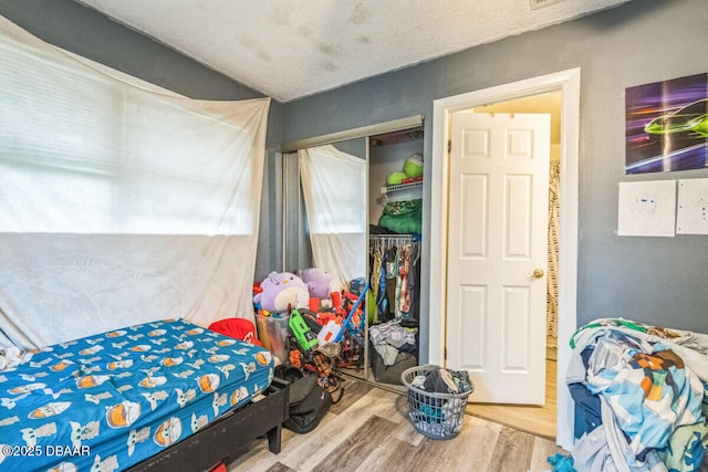 3304 India Palm Dr, Edgewater, FL 32141 - bedroom with wood finished floors and a closet