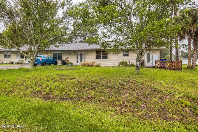 3304 India Palm Dr, Edgewater, FL 32141 - rear view of property with a lawn