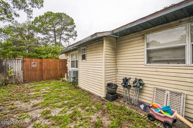 3304 India Palm Dr, Edgewater, FL 32141 - view of home's exterior featuring a central AC unit