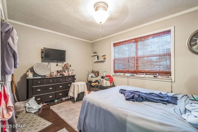 3304 India Palm Dr, Edgewater, FL 32141 - bedroom with a textured ceiling, wood finished floors, and crown molding