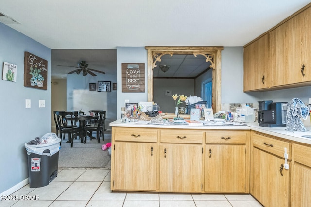 3304 India Palm Dr, Edgewater, FL 32141 - kitchen with light countertops, light tile patterned floors, and ceiling fan