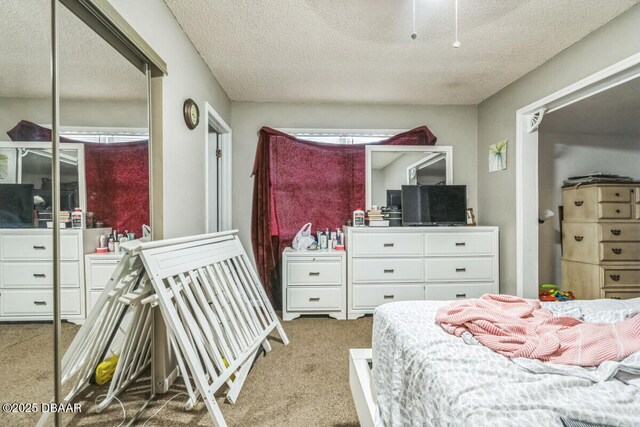 3304 India Palm Dr, Edgewater, FL 32141 - bedroom featuring carpet floors and a textured ceiling