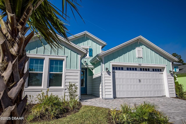 view of front of home with a garage