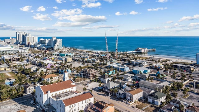 aerial view featuring a water view and a view of the beach