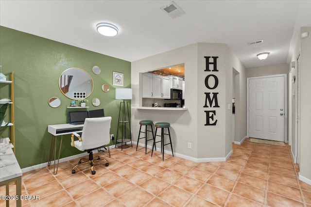140 Limewood Pl Unit 3, Ormond Beach, FL 32174 - office with baseboards and light tile patterned flooring