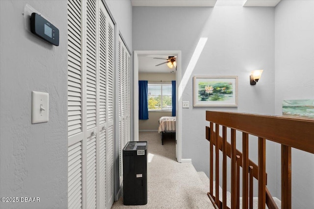 140 Limewood Pl Unit 3, Ormond Beach, FL 32174 - hall with an upstairs landing and carpet floors