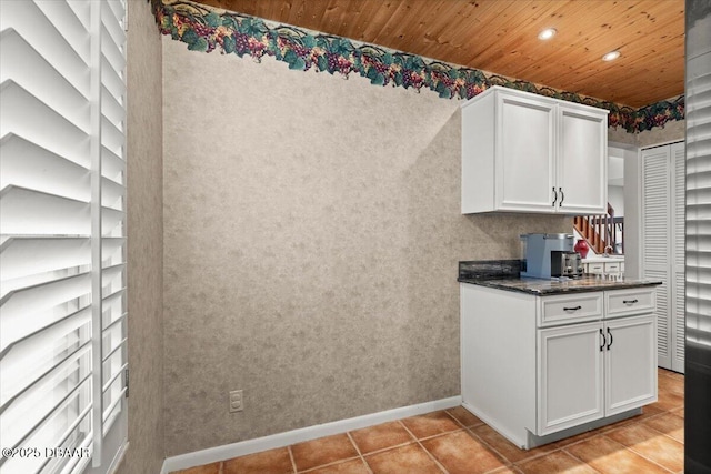 140 Limewood Pl Unit 3, Ormond Beach, FL 32174 - kitchen featuring baseboards, white cabinetry, recessed lighting, light tile patterned floors, and wood ceiling