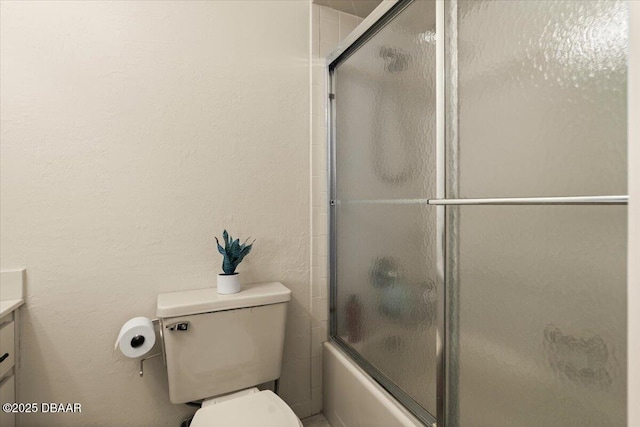 140 Limewood Pl Unit 3, Ormond Beach, FL 32174 - full bathroom with vanity, toilet, and shower / bath combination with glass door