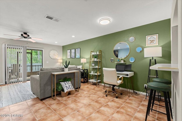 140 Limewood Pl Unit 3, Ormond Beach, FL 32174 - living room featuring a ceiling fan and light tile patterned floors