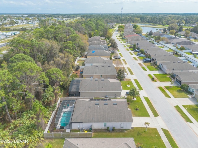 aerial view with a residential view and a water view