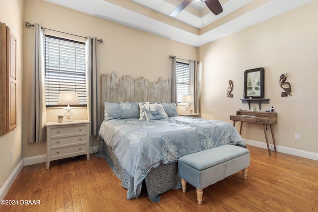 bedroom featuring light hardwood / wood-style floors and ceiling fan