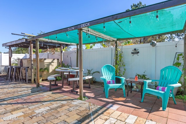 view of patio with an outdoor bar