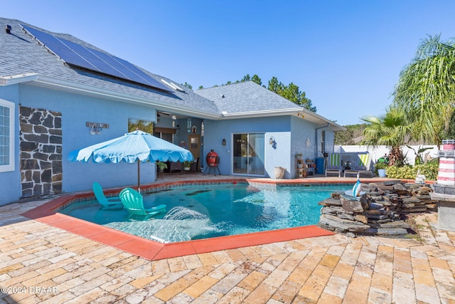 view of pool featuring a patio area