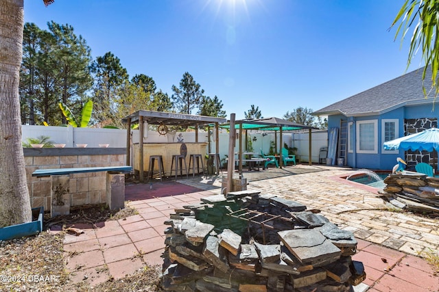 view of patio / terrace with exterior bar