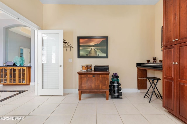 interior space with light tile patterned floors