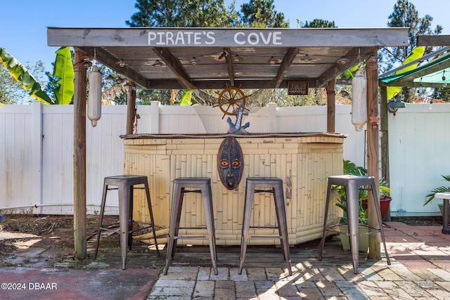 view of patio featuring exterior bar