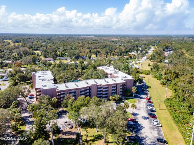 640 N Nova Rd Unit 104, Ormond Beach, FL 32174 - bird's eye view of a heavily wooded area