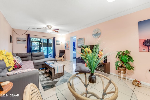 tiled living room featuring ceiling fan