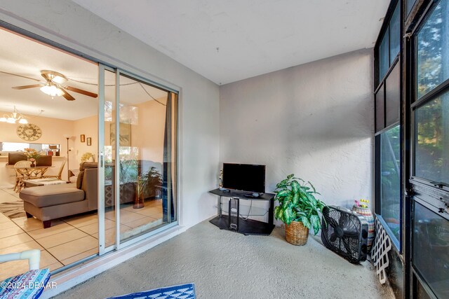 640 N Nova Rd Unit 104, Ormond Beach, FL 32174 - living area featuring ceiling fan