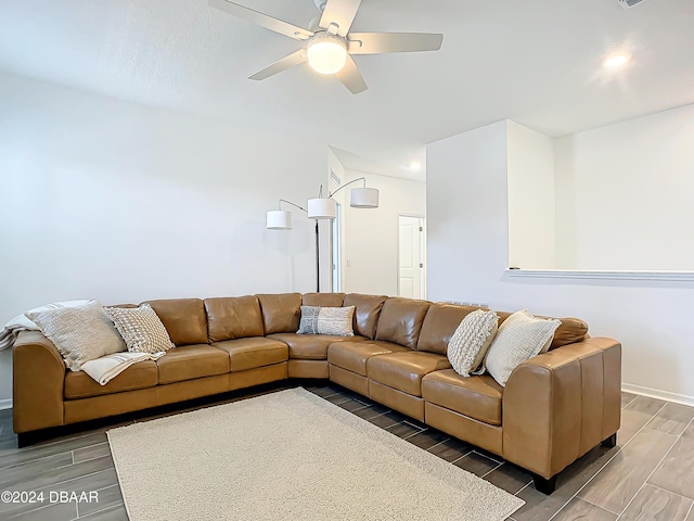 living room featuring ceiling fan