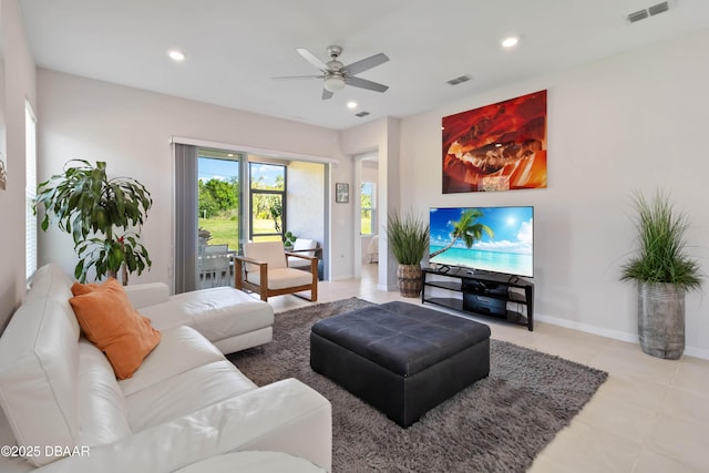 living area featuring visible vents, recessed lighting, and ceiling fan