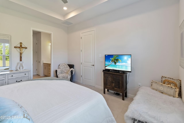 bedroom featuring baseboards, light carpet, ensuite bathroom, and recessed lighting