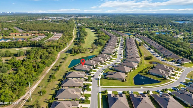 bird's eye view featuring a residential view and a water view