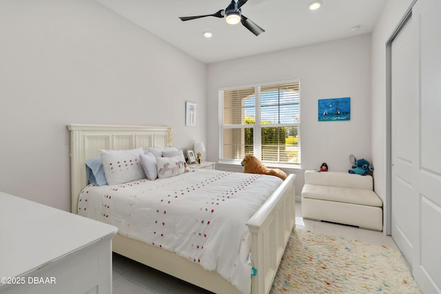 bedroom with recessed lighting, ceiling fan, and light tile patterned flooring